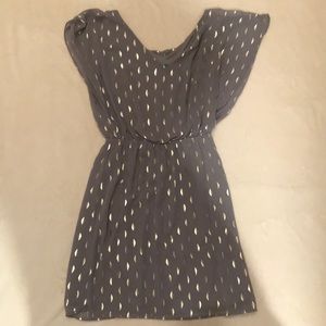 I am selling a gray dress with a gold pattern.